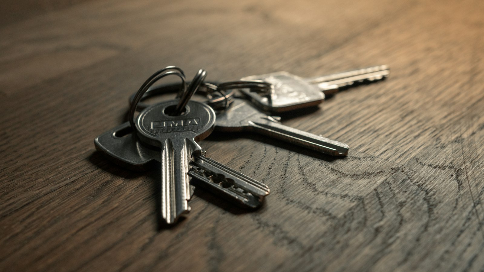 A buyer handing over a deposit cheque for a home purchase in Vernon, BC